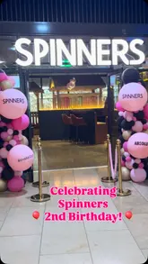 A promotional video for Spinners in Solihull, showcasing the venue's 2nd birthday celebration. The reel features a montage of various activities including electronic darts, virtual clay shooting, and mini golf, interspersed with shots of cocktails and pizza.