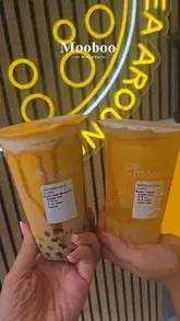 A short, fast-paced montage showcasing the preparation and final presentation of various bubble tea drinks at a new Mooboo location in Blackburn.