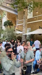 A promotional video showcasing a new Italian terrace located in the courtyard of The Langham in London, featuring live music, cocktails, and small plates.