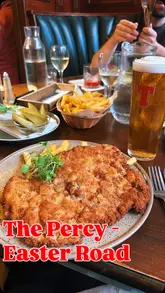 The video is a review of The Percy, a Polish restaurant in Leith. The creator provides a walkthrough of the venue, discusses the menu, and shares their thoughts on several traditional Polish dishes, including pierogi, smalec, beef goulash, and pork schnitzel.