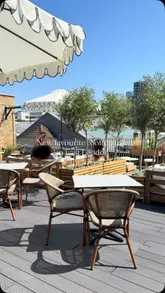 A short, visually appealing reel showcasing a rooftop cafe in East London. The video features a mix of interior and exterior shots, highlighting the bright, spacious atmosphere and the Asian-inspired brunch menu.