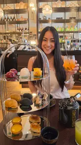 A short, engaging reel showcasing the 'Tea Tales' Chinese-inspired afternoon tea at Dim Sum Library in Covent Garden. The video highlights the unique birdcage presentation of the dim sum, the elegant venue interior, and the interactive elements like the tea selection and open kitchen.