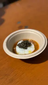 A short video capturing chef Adam Handling plating a dish of Cornish cod with lobster bolognese and wild garlic, topped with caviar, at the 3rd Bite food festival.