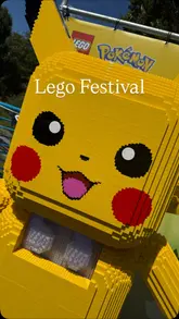 A fast-paced, handheld vlog-style video capturing a child's experience at the Lego Festival at Legoland Windsor. The video moves quickly through various interactive zones, including a Pokemon play area, an F1 thrill zone, a music stage, a creative building zone, and a chill-out area, highlighting the hands-on activities available for visitors.