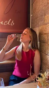 The video features a creator visiting The Scotch Whisky Experience and Amber Restaurant in Edinburgh to try their 'Taste of Scotland' menu. It includes shots of the venue, the tasting menu (starters, mains, dessert), and whisky pairings.