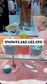 The video features a first-person perspective of someone holding various gelato sticks from Snowflake Gelato at the Trafford Centre. The creator presents three different flavours—Matcha & Ube, Mango, and Cotton Candy—against the backdrop of the branded kiosk. The editing is quick and rhythmic, focusing on the visual appeal of the desserts.