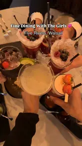 A montage-style video showcasing a variety of Punjabi dishes and cocktails at Five Rivers in Walsall, featuring close-ups of curries, naan, and appetizers, alongside shots of the restaurant's interior and bar area.