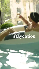 A cinematic showcase of a luxury staycation at the Pan Pacific London, featuring an infinity pool, champagne, and a relaxing hotel environment.