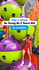 A fast-paced montage showcasing a child participating in a Clip 'n Climb session at The O2 in London. The video highlights various climbing walls and the 10m drop slide, emphasizing the suitability for young children.
