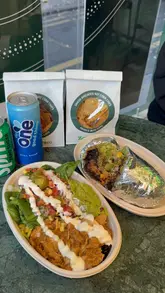A short promotional video showcasing a burrito and a salad bowl from Zambrero, highlighting the fresh ingredients and assembly process.
