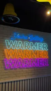 A promotional reel covering the grand opening of an Insomnia Cookies branch in Newcastle, showcasing the late-night opening hours, the interior, and various activities like magic tricks and a prize wheel.