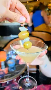 The creator takes viewers on a date night itinerary along The Strand in London, visiting The Savoy American Bar for cocktails, Roka for Japanese dinner, and Eve Bar for late-night drinks and caviar. The video features quick cuts, personal commentary, and close-ups of the food and drinks.