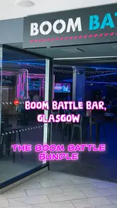 A promotional reel for Boom Battle Bar in Glasgow, showcasing the 'Boom Bundle' package which includes an hour of games, two drinks, and two small plates. The video features the group playing darts, enjoying cocktails and mocktails, and sampling various small plates like Korean BBQ cauliflower and pepperoni twists.