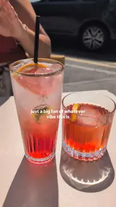 A short, music-led montage showcasing the exterior, outdoor seating, and drink/food offerings at Curio Cafe Bar, emphasizing a relaxed, sunny atmosphere.