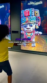 The video provides a tour of The Timewalk Exhibition in London, showcasing various immersive historical projections and interactive displays. It highlights the educational and engaging nature of the experience, particularly for children, using text overlays to convey key information about the venue.