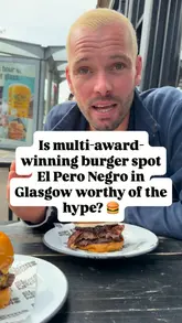 Two creators visit El Perro Negro in Glasgow to review their burgers. They discuss the quality of the ingredients, the taste, and the overall experience, ultimately giving a very positive verdict.