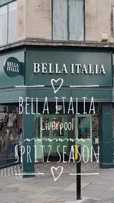 A short video showcasing a meal and drinks at Bella Italia, featuring close-ups of various pasta dishes, appetizers, and summer spritz cocktails.