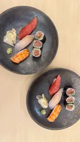 A montage-style video showcasing the interior, chefs, and various courses of a Japanese tasting menu at Roketsu in Marylebone. The video features high-quality, static shots of the food and venue, set to music with minimal text overlays.