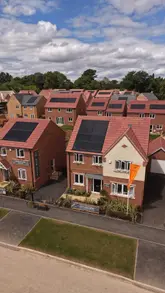 A promotional video for a housing development called Westwood Park, showcasing the homes and the surrounding local amenities including a cafe, park, and castle.