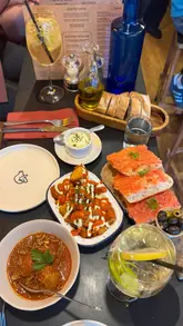 A short, engaging review of PIGGS, a Spanish wine bar and cafe in Edinburgh. The video features a variety of tapas dishes, including patatas bravas, croquetas, and steak, alongside sangria, and provides a glimpse of the venue's interior and exterior.