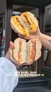 A promotional reel for a new bagel shop in Nottingham, featuring a tour of the interior, staff interactions, and close-ups of various bagel options and coffee.