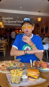 The video features a creator interviewing the owner of 'The Queens Nook' to explain the benefits of the EatClub app, while showcasing various dishes like a full English breakfast, a cheeseburger with chips, and a pizza. The content focuses on the affordability and the 'mates rates' concept offered through the app.