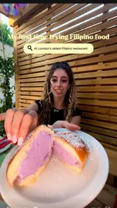 A creator visits Bintang, London's oldest Filipino restaurant, to try a variety of dishes including spring rolls, hot honey wings, bagoong fried rice, oxtail kare kare, seafood palabok, buko pie, and an ube ice cream sandwich. The video features a tour of the venue and a detailed look at the menu and drinks.