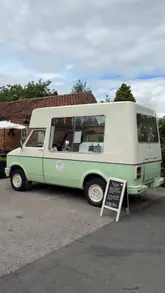 A promotional video for 'Berry Social,' a mobile ice cream van, featuring the preparation and serving of soft-serve ice cream to customers.