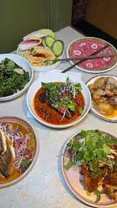 A review of Gaga restaurant in Glasgow, showcasing their South East Asian inspired menu, interior, and exterior. The video features close-ups of various dishes, the menu, and the restaurant's ambiance.