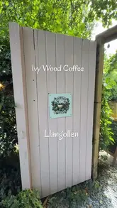 A short, casual tour of Ivy Wood Coffee in Llangollen, highlighting the outdoor, canal-side setting, the coffee, and the food selection including sausage rolls and cakes.