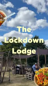 A short montage video showcasing The Lockdown Lodge, a riverside pop-up venue in Hambleden. The video features shots of the outdoor seating area, the menu board, and casual street food items like burgers and loaded fries, set to music with text overlays describing the location.