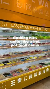 A short video showcasing the experience of selecting ingredients for a hot pot meal at Casserole Wang, followed by the prepared dishes and bubble tea.