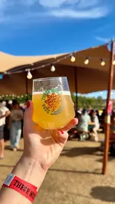 A vlog-style video showcasing a visit to the These Hills beer festival in Sussex, highlighting the beer selection, street food, pub games, and the overall festival atmosphere.