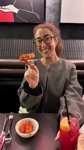 A compilation video featuring a creator visiting various restaurants and cafes in Glasgow, showcasing a wide range of cuisines including Indian, Chinese, Italian, Japanese, and Mexican. The video uses quick cuts to highlight different dishes and venue atmospheres.