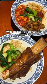 A short video showcasing JWD Noodle in Cambridge, featuring the restaurant's interior, the ordering process, the chef hand-pulling noodles, and a variety of their noodle dishes and sides.