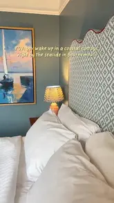 A promotional video showcasing a room and the seaside location of the Marriott Bournemouth, highlighting the coastal decor and sea views.