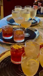 A fast-paced, energetic montage showcasing the launch party of Dishoom in Leeds. The video features a variety of shots including cocktails being served, the interior of the restaurant, staff preparing drinks, and guests enjoying the atmosphere.