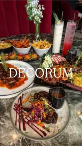 A promotional reel for Décorum in Birmingham, showcasing their steak and seafood menu, mocktails, and luxurious interior design.