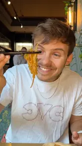 A couple visits Banana Tree in Cardiff to review their £10.95 lunch deal, showcasing the venue's interior, the menu options, and their meal consisting of chicken gyoza ramen, chicken pad thai, and banana fudge cake.