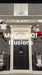 A promotional image for the Museum of Illusions in London, featuring four people posing in an illusion room designed to look like they are walking on walls. The composition is symmetrical and highlights the interactive nature of the venue.