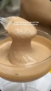 A short, focused video showcasing a 'crema caffè' drink at Badiani in London. The video uses close-up shots to highlight the creamy texture of the coffee and includes the price and venue name, effectively promoting the product.