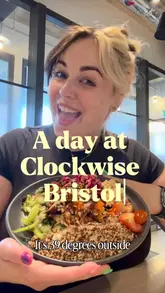 A creator documents a day working at Clockwise Bristol, highlighting the workspace, private pods, air conditioning, and the gluten-free lunch options available at the on-site cafe.