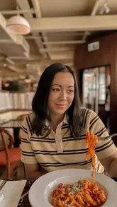 A promotional video for Banchina Italian at Gloucester Quays, featuring a montage of the restaurant's exterior, interior, and various Italian dishes including arancini, pizza, pasta, and tiramisu.