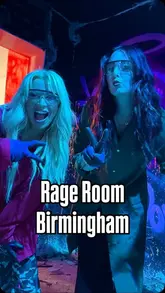 A high-energy, handheld-style video showcasing a visit to a rage room in Birmingham. The creator and their friend are filmed smashing various items like electronics and glass with hammers and axes, highlighting the therapeutic and fun nature of the activity.