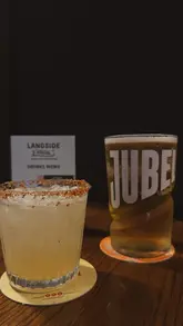 A fast-paced, handheld-style reel showcasing Langside Social in Glasgow, highlighting its pool tables, interactive darts, and Mexican-inspired food and drinks.