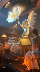 A short, atmospheric montage showcasing a 1930s-themed jazz club in London, featuring live music, performers in period costumes, and cocktails.