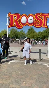 A high-energy vlog-style video showcasing the Roost Festival, featuring a wide variety of chicken-based street food, live music, and festival atmosphere.
