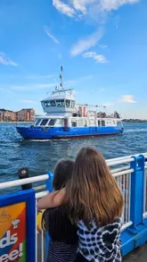 A family-friendly vlog showcasing a budget day out in South Shields, featuring a trip on the Shields Ferry and a visit to the Ocean Beach Fun Fair and local park.