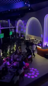 A listicle-style video showcasing four 'aesthetic' restaurants in Manchester: Karam, Gardens, Layl, and Mnky Hse. The video features a voiceover and text overlays to introduce each venue, highlighting their interior design, atmosphere, and some food/drink offerings.
