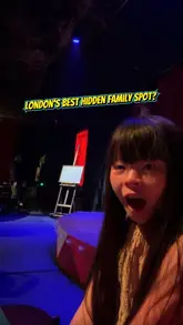 A vlog-style video showcasing a family visit to The Magician's Table in London, highlighting the immersive magic show, lounge drinks, and the child's reaction to the performance.